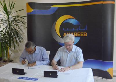 Hashim Moraisel, CEO ANABEEB, and Stephan Neuburger, Managing Director KROHNE Group, signing the cooperation agreement